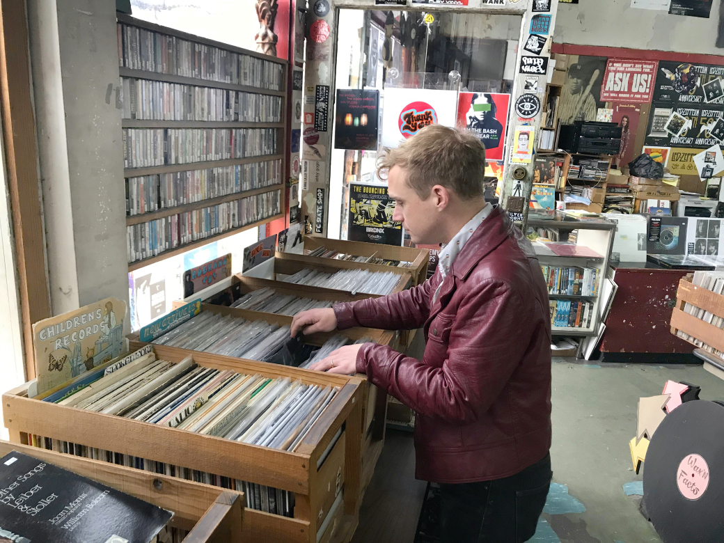 RECORD SCORE: Philip Frobos of the band Omni stops by Wax 'n' Facts to scope out the new arrivals.