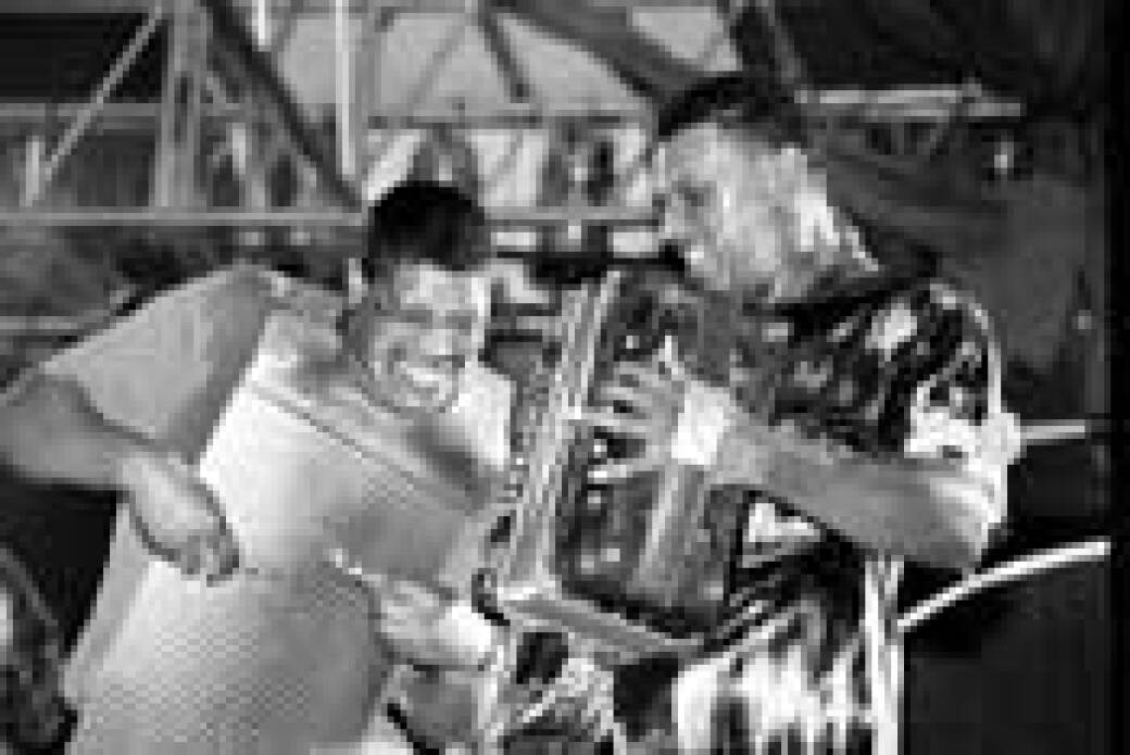 ONE OF THE REGULARS: Chubby Carrier (right) with washboard player Earl Salley