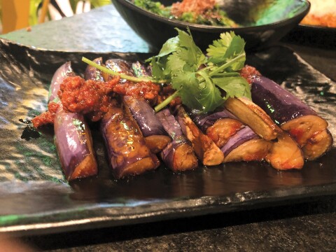 AFTER THE PURPLE RAIN: Food Terminal's creamy eggplant is topped with a spicy sauce. Photo by Cliff Bostock.
